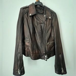 Wilson’s genuine leather motorcycle jacket, purplish gold black